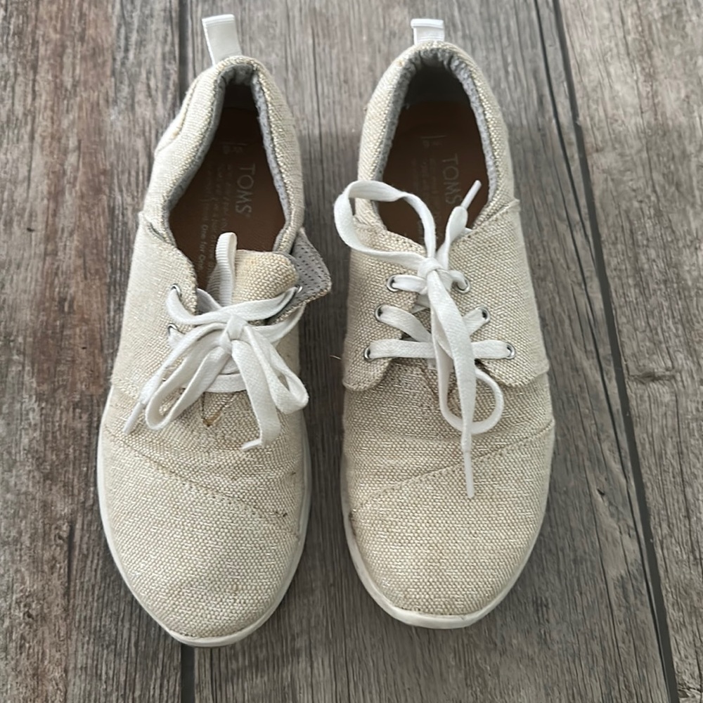 Tom’s sneakers
